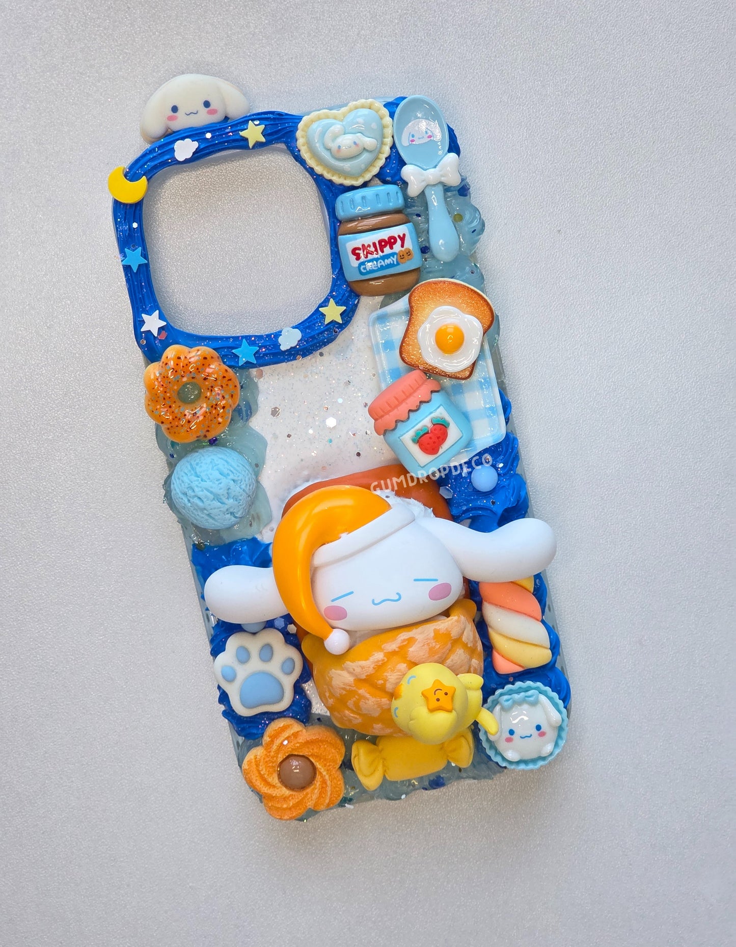 Unique custom decoden phone case with Pop Mart or Top Toy figurines. Handmade, protective & a must-have for fans. Cinnamoroll Happy Baking Sanrio