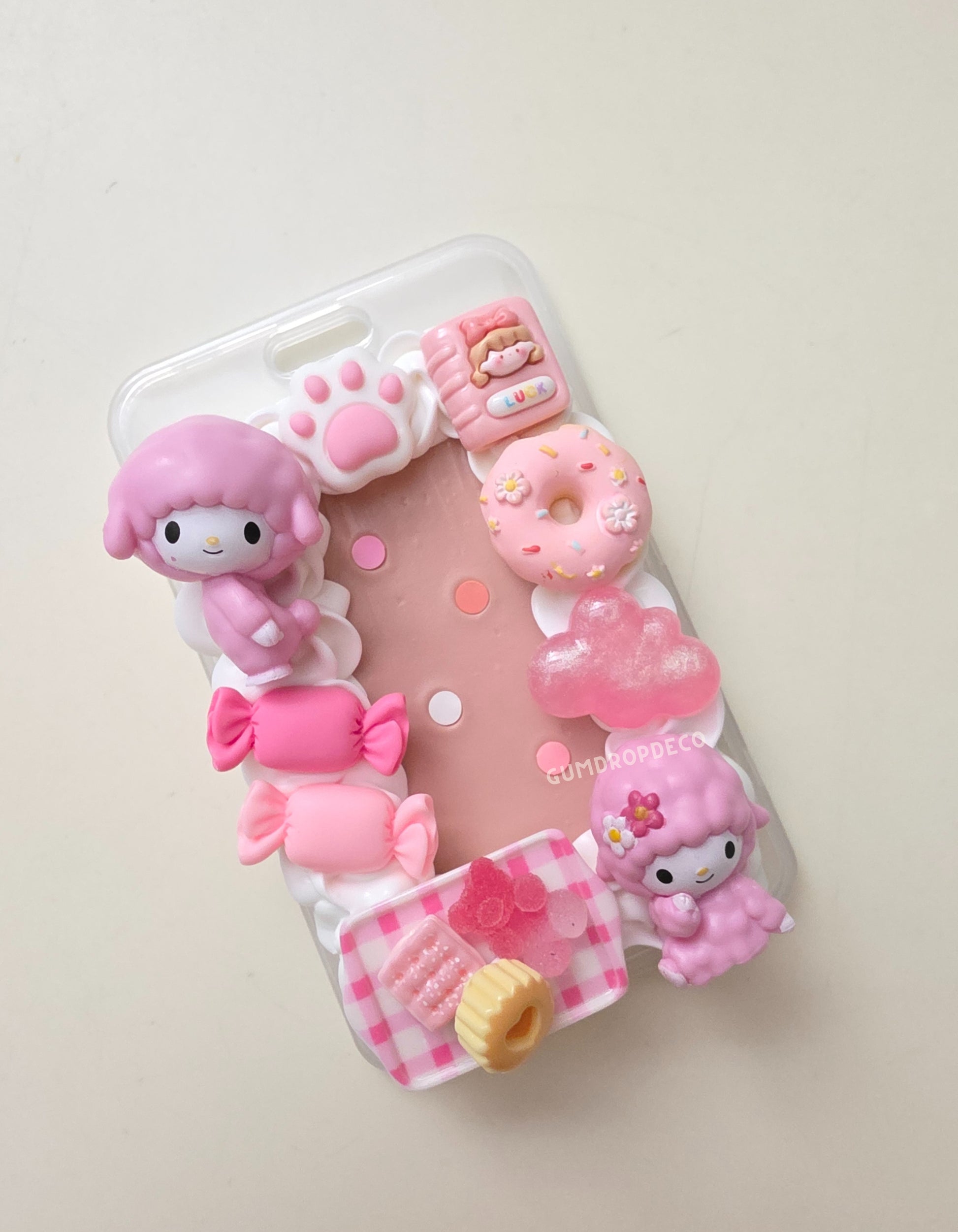 Personalized decoden card sleeve, handmade with colorful charm decorations. Sanrio My Sweet Piano theme