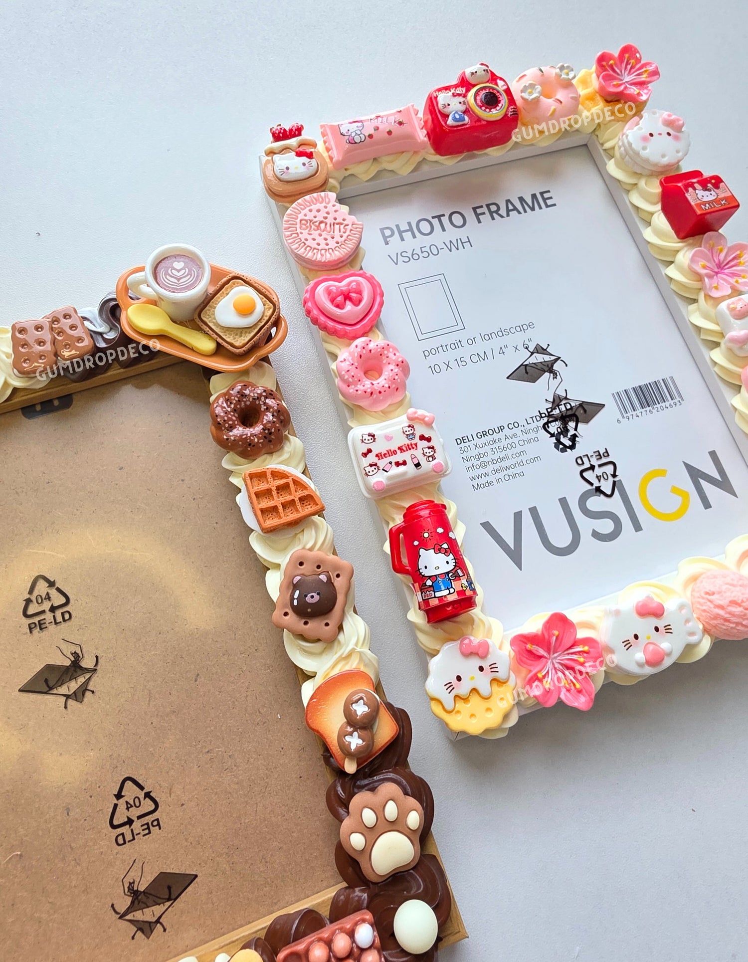 Custom Decoden Photo Frame – handcrafted 10 × 15 cm frame decorated with pastel whipped cream-style design and cute charms. Sanrio Hello Kitty and Food Bakery theme.