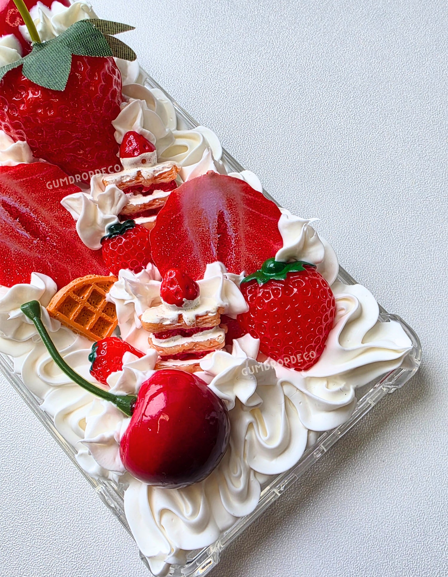 Phone case decorated with strawberries, whipped cream. Fruity Parfait decoden phone case with handmade whipped cream details & colorful fruit charms. Cute, protective & customizable design.